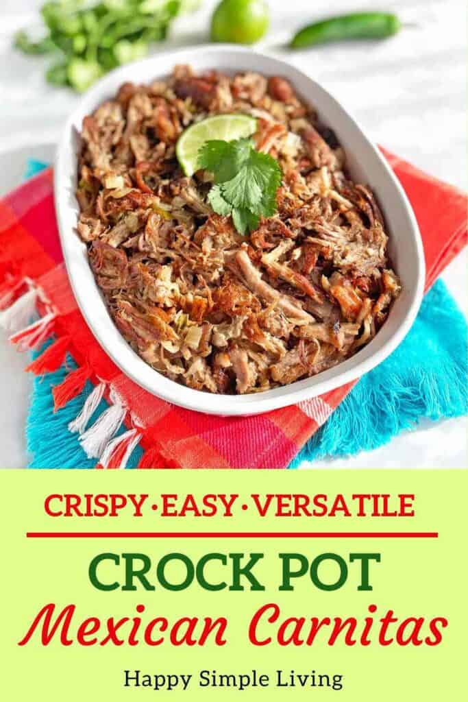 A dish of cooked carnitas garnished with lime and cilantro is placed on a colorful cloth. The text reads Crispy. Easy. Versatile. CROCK POT Mexican Carnitas. Happy Simple Living.