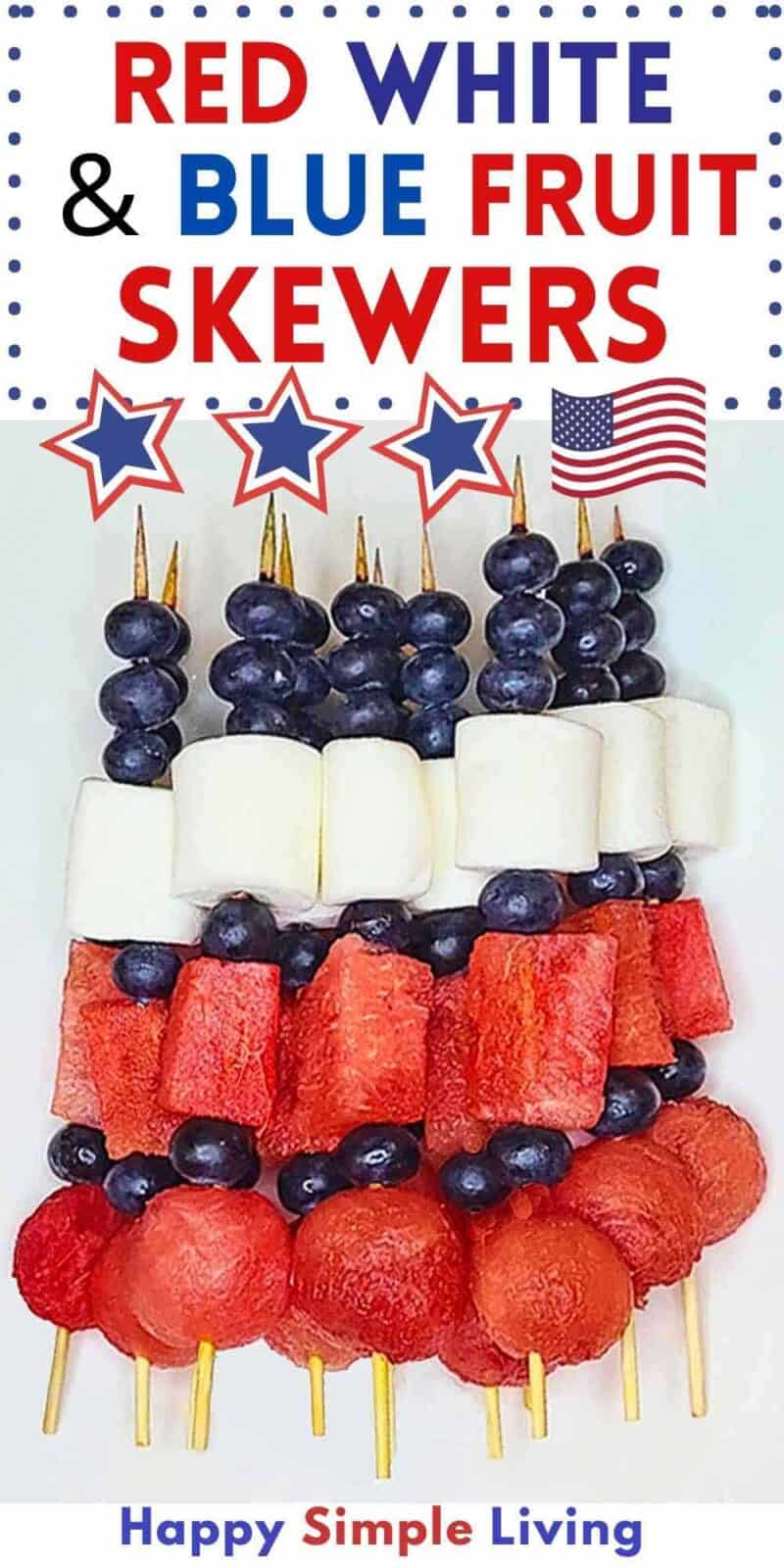 Watermelon, blueberry and marshmallow fruit skewers on a platter.